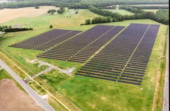 Renewable Solar Array Grid Under Blue Sky